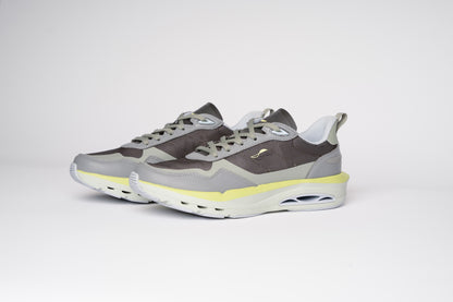 Gray and yellow sneakers on a white background